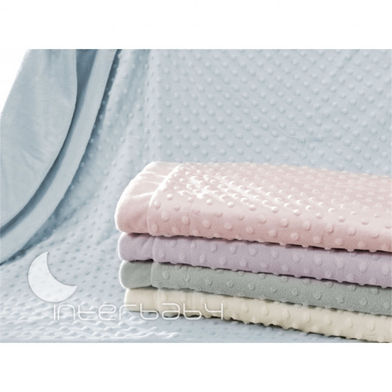 Pătură pentru copii, de culoare albă cu puncte în relief Inter Baby 102993 