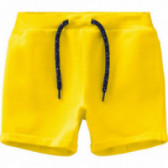 Pantaloni scurți din bumbac organic galben, pentru băiat Name it 107123 