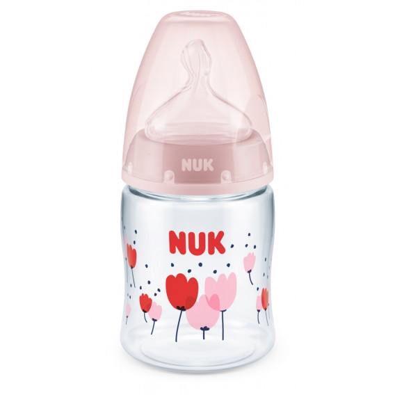 Sticlă din polipropilenă de culoare roz cu flori, First Choice, control Termo cu tetină debit mediu pentru 0-6 luni, 150 ml. NUK 181485 