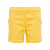 Pantaloni scurți de culoare galbenă pentru fete Name it 28860 