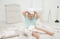 Cute,toddler,playing,with,toilet,paper,in,bathroom